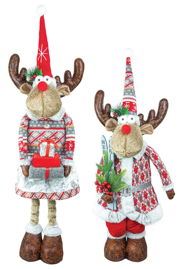 The WINTERY MOOSE STANDING STRETCH LEG Boy or Girl gnome features two plush moose in festive winter outfits—one holding a gift, the other greenery and a sign—bringing rustic charm to your Scandinavian Christmas décor.