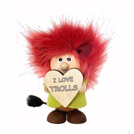 A handcrafted Scandinavian figurine, the Troll with red hair, holds a wooden heart-shaped sign reading I LOVE TROLLS.