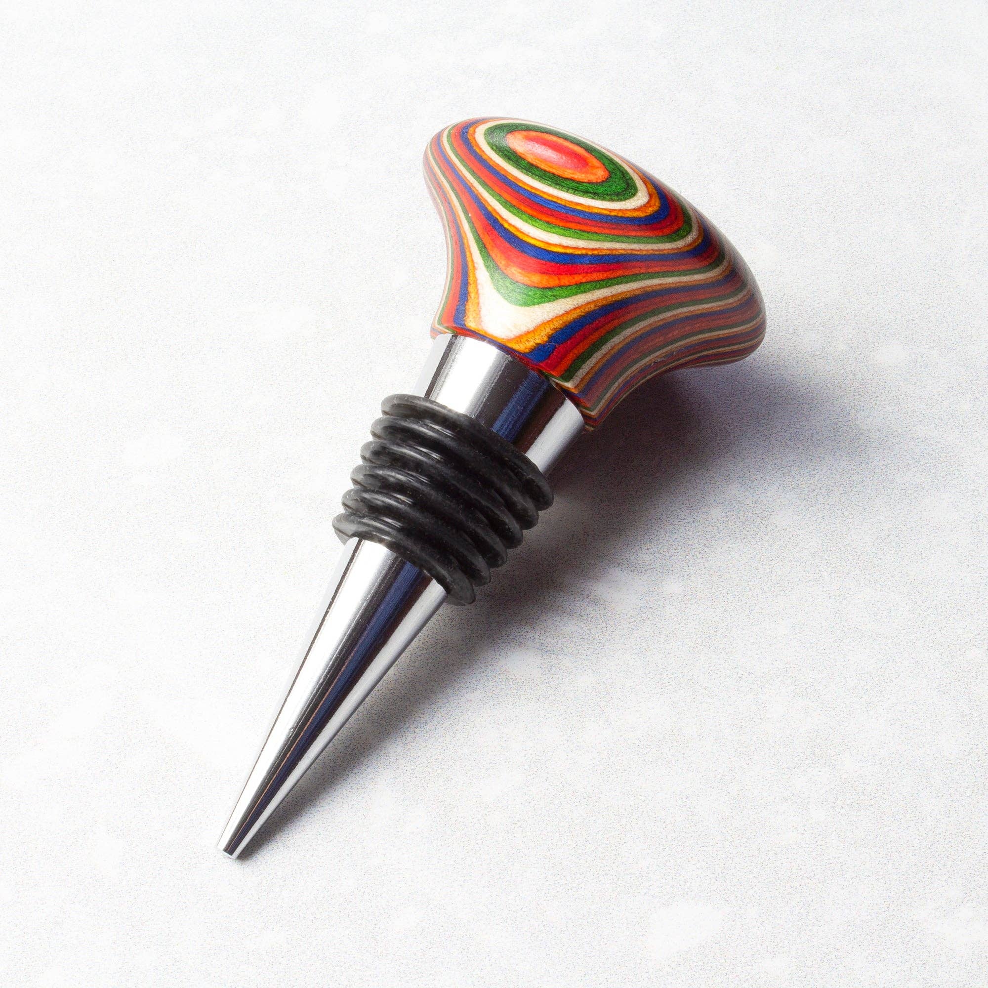 The Marrakesh Collection Wine Bottle Stopper showcases a lively, striped wooden handle and is designed with air-tight silicone rings for an impeccable seal.