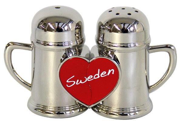 A set of two stainless steel salt and pepper shakers, shaped like mugs with a red Sweden heart between them.
