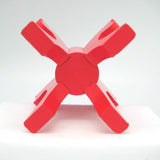 A red Swedish candle holder featuring four Dala horse heads, viewed from the front against a plain white background—perfect for adding a touch of Scandinavian decor.