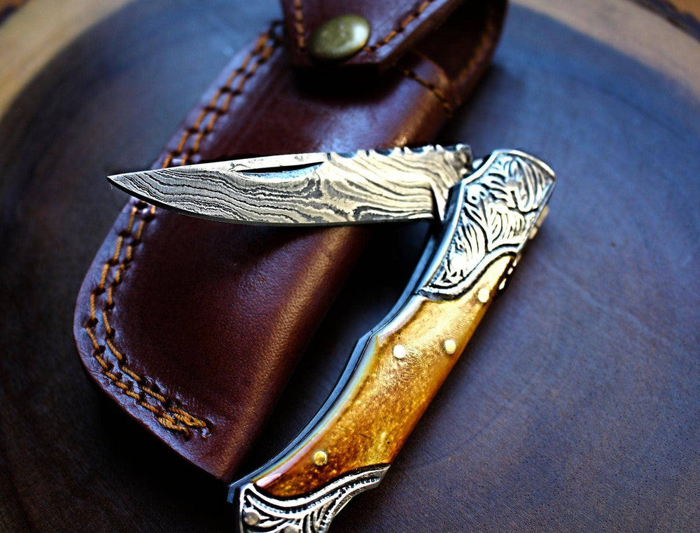 Knife: Damascus Steel handmade Pocket Knife with burnt bone handles