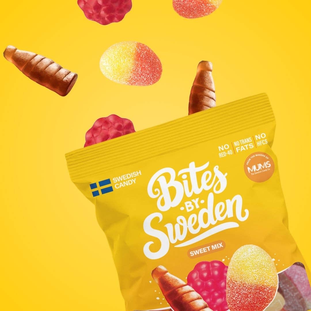 Yellow bag labeled “Bites by Sweden” with assorted Swedish gummy candies spilling out onto a matching yellow background.
