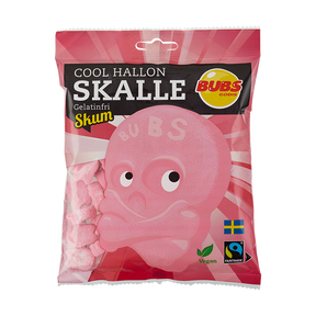 The BUBS Sour Raspberry Skulls (90g) pack showcases pink, skull-shaped raspberry candies that are vegan and gelatin-free. These treats, highlighted by the Swedish and Fairtrade certified logos, provide a delightful snacking option that prioritizes quality and ethical standards.