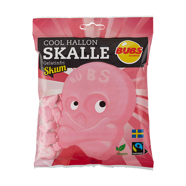 The BUBS Sour Raspberry Skulls (90g) pack showcases pink, skull-shaped raspberry candies that are vegan and gelatin-free. These treats, highlighted by the Swedish and Fairtrade certified logos, provide a delightful snacking option that prioritizes quality and ethical standards.