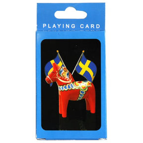 The "Playing Cards: Sweden Dala Horse with Swedish Flags" features a vibrant depiction of a Dala horse standing proudly before two flags, one akin to the Swedish flag, all set against a serene blue backdrop.