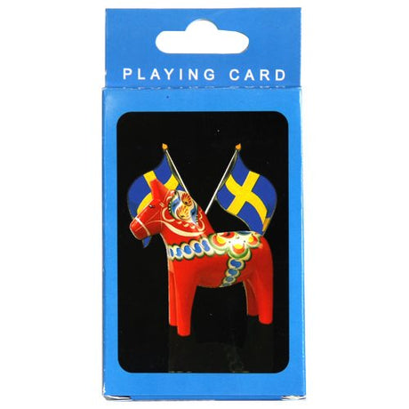 The "Playing Cards: Sweden Dala Horse with Swedish Flags" features a vibrant depiction of a Dala horse standing proudly before two flags, one akin to the Swedish flag, all set against a serene blue backdrop.