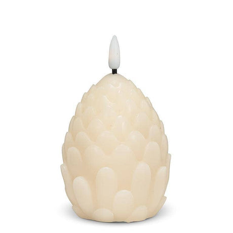 An ivory flameless LED candle shaped like a pinecone with a black wick and an unlit white flame-shaped tip; battery operated, 4" high.