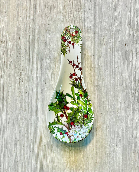 The Spoon Rest: Holly & Berries Christmas Holiday features a festive holly and berry design on a light wood surface, making it a charming addition to your eco-friendly dinnerware collection.