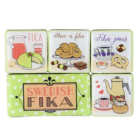 The Magnet: Swedish FIKA 5 Magnets in a Plastic Case features charming illustrations of Swedish FIKA drinks and pastries with playful text. Imported from Sweden, these square magnets add a touch of Scandinavian charm to your kitchen.