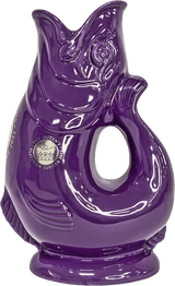 The Gluggle Jug: Limited Edition Queens Jubilee Gluggle Jug Extra Large is a glossy purple, fish-shaped ceramic pitcher featuring a Platinum Jubilee 2022 crest—an eye-catching collectible for the Queen’s Jubilee.