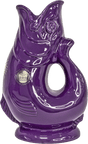 The Gluggle Jug: Limited Edition Queens Jubilee Gluggle Jug Extra Large is a glossy purple, fish-shaped ceramic pitcher featuring a Platinum Jubilee 2022 crest—an eye-catching collectible for the Queen’s Jubilee.