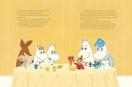 Three Moomin characters, a kangaroo, and a small figure sit at a breakfast table with food and drinks against a yellow background. Text above them is inspired by the book Last Dragon in Moominvalley by Tove Jansson.