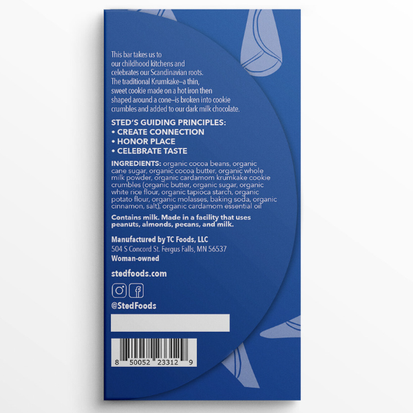 Back of a chocolate bar package showing ingredients, principles, manufacturer details, and QR code on a blue and white background inspired by Scandinavian dark milk chocolate.