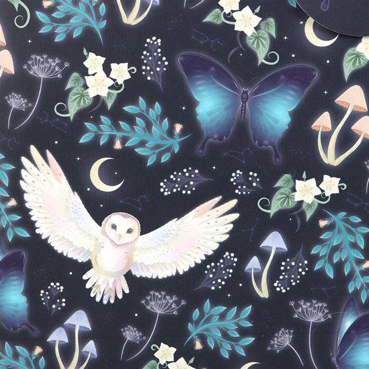 Patterned midnight forest design with a white owl, blue butterfly, moons, mushrooms, leaves, and flowers on a dark background—perfect for gifting with the Gift Bag: Midnight Forest Owl Print Medium Gift Bag.