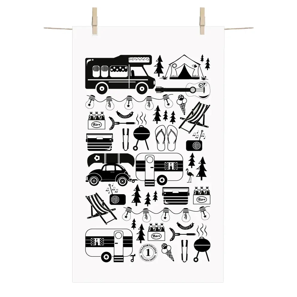 The Camping Terry Towel, designed by Anneko, features a charming black and white illustration with camping elements like vehicles, tents, grills, chairs, trees, and lights. Its perfect for those who adore camping images.