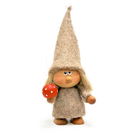 The Ornament: Girl with Mushroom Christmas Tree Ornament features a charming design reminiscent of handmade Scandinavian gnomes, showcasing a wooden figurine with a tall, pointy hat and a felt robe while holding a small red mushroom adorned with white spots. This whimsical piece is perfect for adding magical holiday charm to your Christmas tree decor.