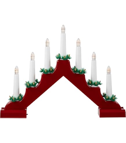The Scandilight Pinecone Candle Ring for a 7-piece candelabra adds green foliage and pinecones around each candle, creating inviting welcome home lights perfect for the season.