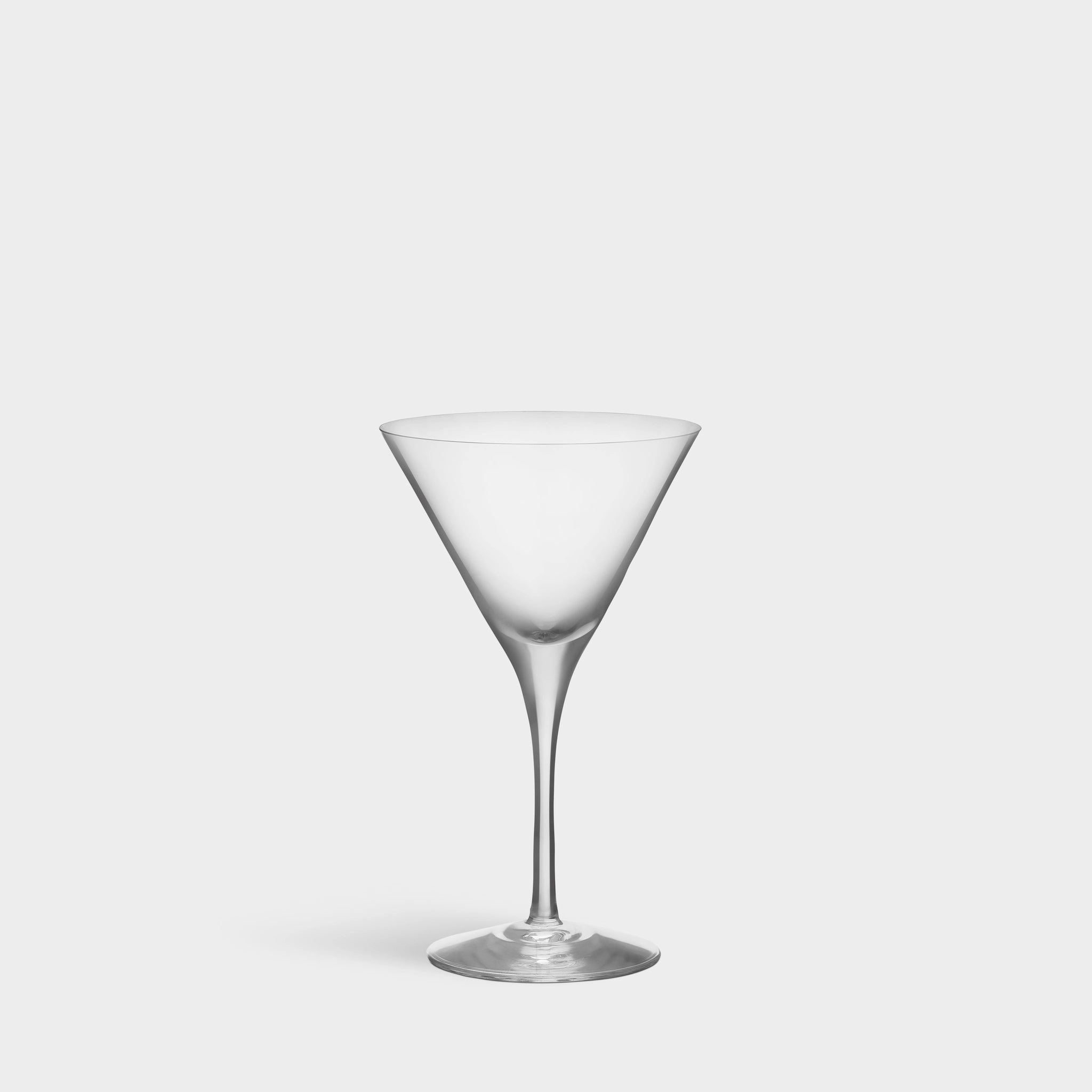 A pristine Orrefors: More Martini Glass 6.4oz from the 2-pack is displayed against a plain white background.