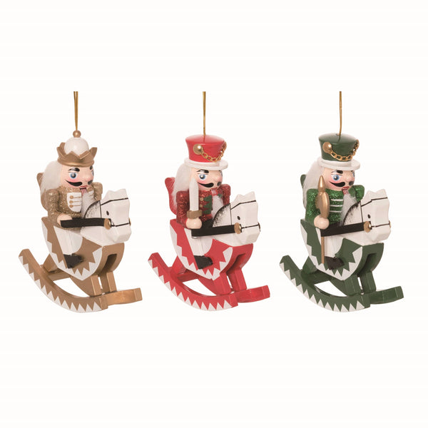 Set of three Ornament: Wood Rocking Horse Nutcracker Ornaments in gold, red, and green, each riding a matching wooden horse with hanging strings—a delightful addition to your holiday decor.