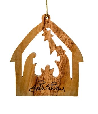 Ornaments: Stable with Nativity made from olive wood in Bethlehem, Israel, features cutout figures and "Bethlehem" inscribed—an authentic Holy Land ornament.