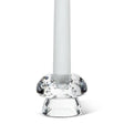 A white candle stands upright in the Mushroom Glass Taper Candle Holder, which measures 2" tall by 2.5" in diameter and features a rounded, textured base inspired by mushroom decor.