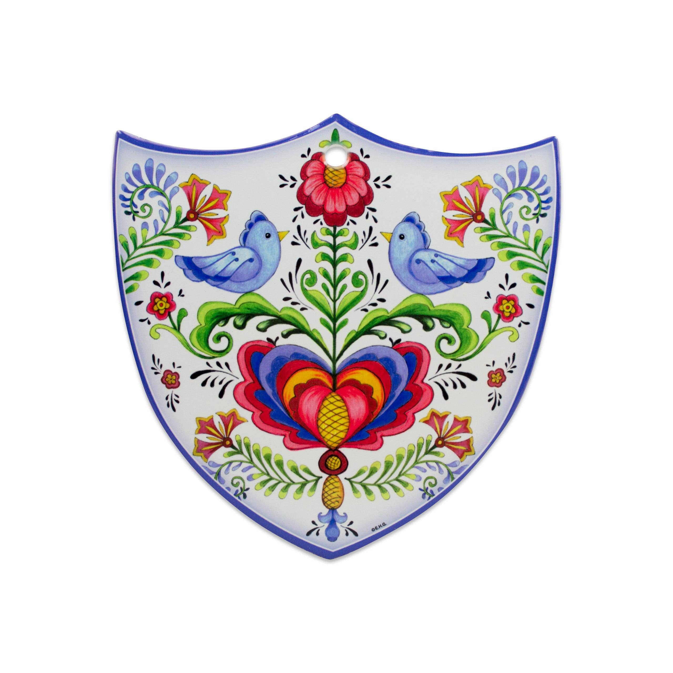 The Tile: Lovebirds Folk Art Cork Backed Ceramic Shield is a Nordic-designed wall decor featuring blue birds, vivid flowers, and symmetrical patterns—an ideal Swedish novelty gift to bring folk art charm to your home.