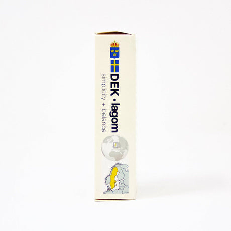 Side view of a box labeled "Playing Cards: DEK Lagom (Sweden)" featuring a Swedish flag, globe, and map of Sweden highlighted in yellow. Text reads "simplicity + balanced living.