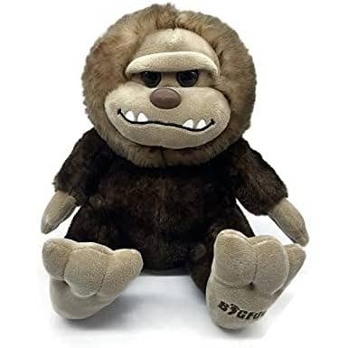 Introducing the Plush: Wild Onez Bigfoot Boy 7"! This delightful stuffed animal features charming brown fur with a beige face and feet, and sits upright. Ideal as a toddler toy, its endearing grin is sure to spark young imaginations and offer hours of cuddly companionship.