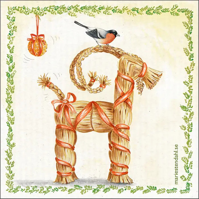 The Dish Cloth: Straw Goat with Red Ribbons / Christmas features a festive Yule goat with a bird on its head, an orange ornament, and a green leafy border—ideal for eco-friendly holiday cleaning or as a Swedish collectible.