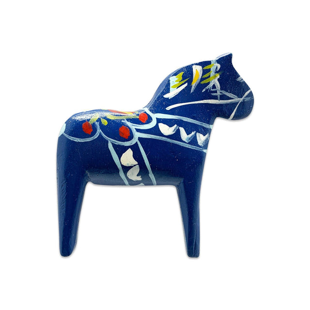 Blue Swedish Dala Horse refrigerator magnet, 3" tall by 2.75" wide, hand-painted with white, yellow, and red floral details—a charming souvenir and decorative accent for your fridge.