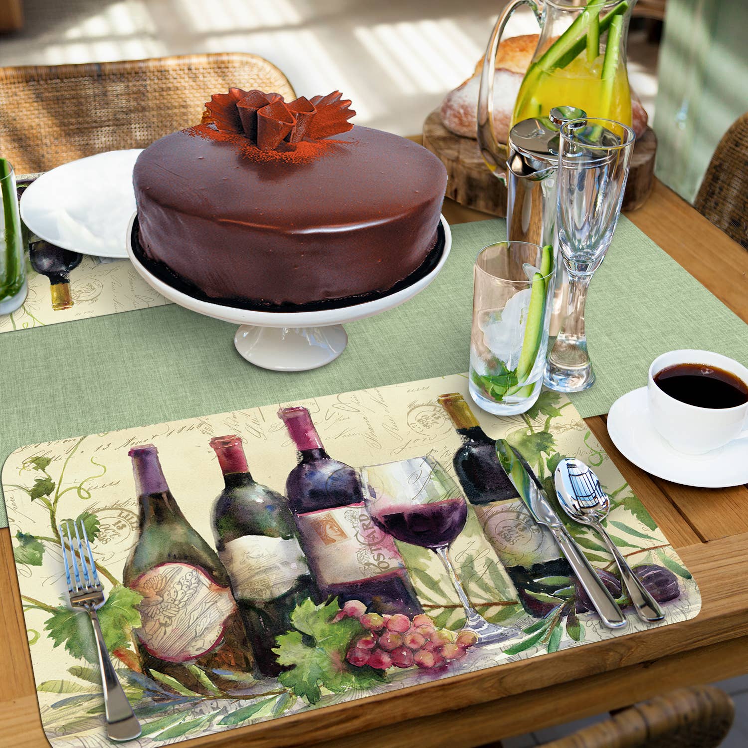 A rustic wine-themed table setting includes a chocolate cake, Rustic Wine Reversible Rectangular Plastic Placemats, a glass water pitcher, a coffee cup, and a glass with cucumber slices.