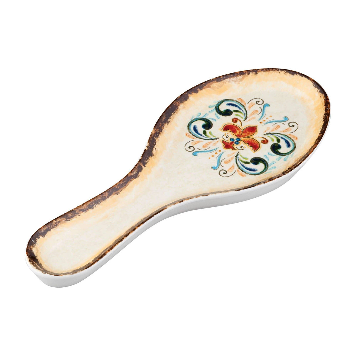 Ceramic spoon rest with a folk art floral pattern, scalloped brown edges, and a cream background.
