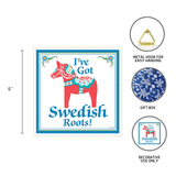 Tile: Ive Got Swedish Roots! Swedish Dala Horse Wall Plaque is a 6x6 square tile with a red Dala Horse and text, includes a metal hook, comes in a gift box, and is for decorative use only.