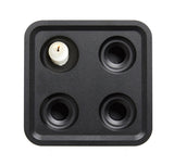 The Stumpastaken Fyran is a white, square candle holder with four round slots, crafted from 100% recycled material. Swedish-designed and powder-coated, it brings sustainable style to any interior.