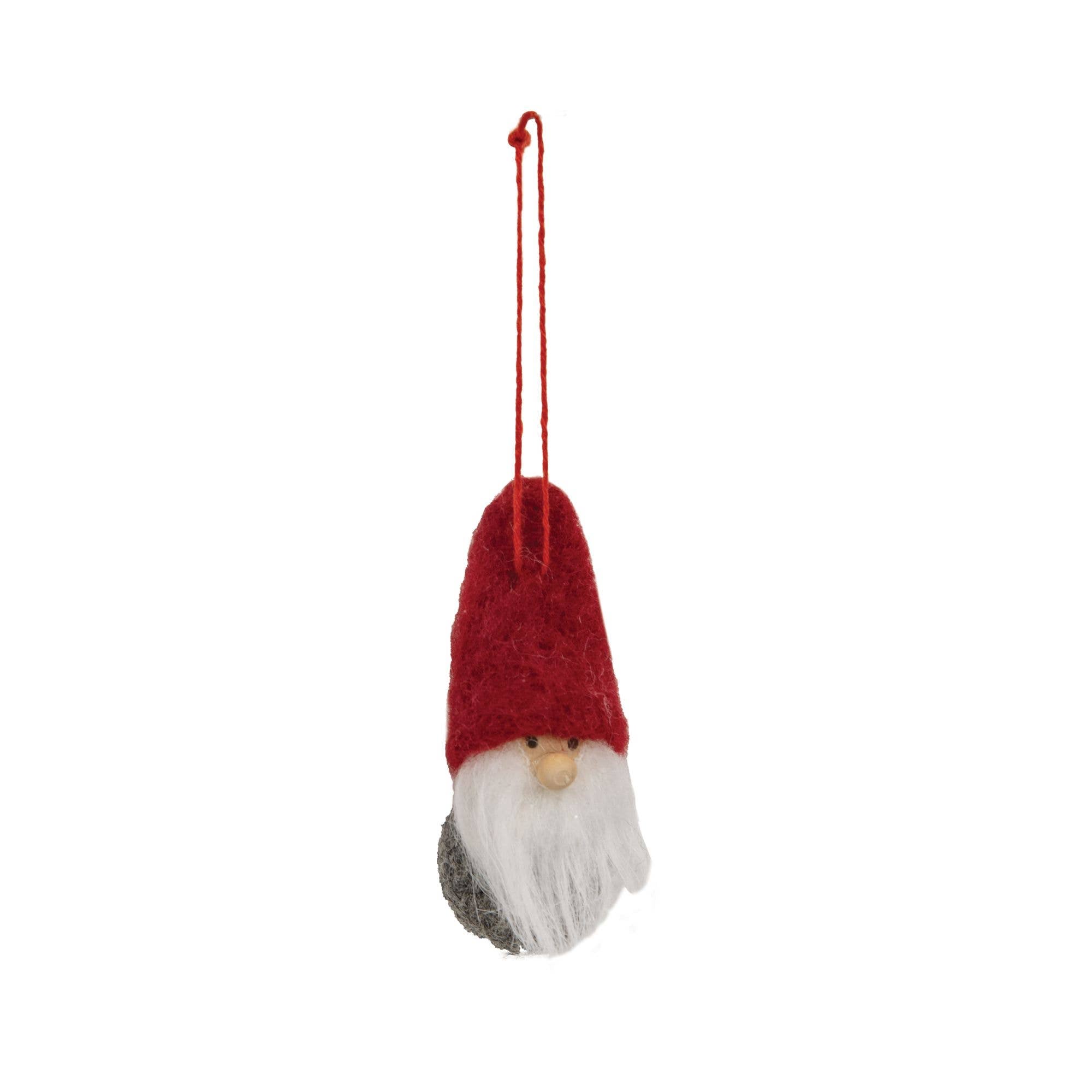 The Ornament: Felted Mini Red Hat Tomte - Nisse - Gnome 3 features a white beard and hanging loop, ideal as a Christmas tree ornament or miniature gnome figurine, shown against a white background.