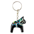 Black Dala horse keychain featuring colorful patterns, attached to a silver metal ring.