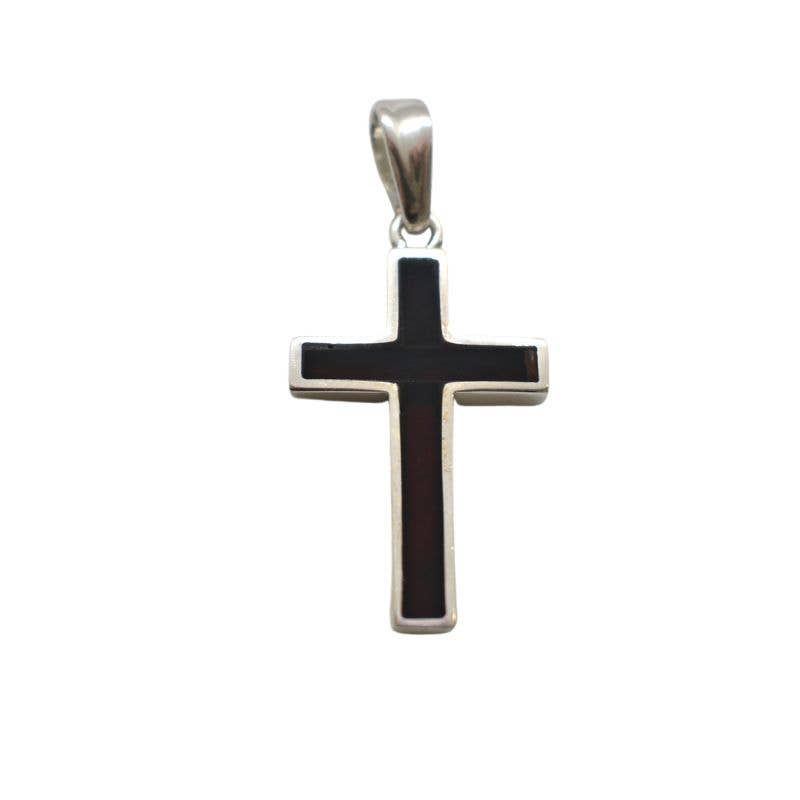 The Cherry Amber Sterling Silver Cross Pendant showcases a sleek design with a striking black inlay.