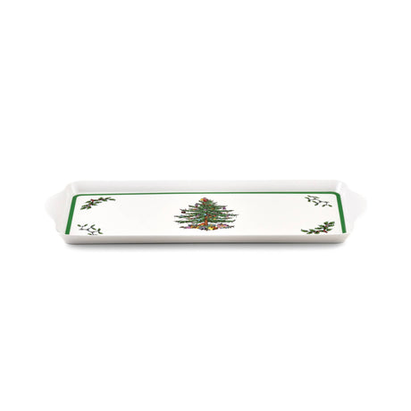 Rectangular melamine tray with green border, Christmas tree illustration in the center, holly accents in the corners, and two side handles.