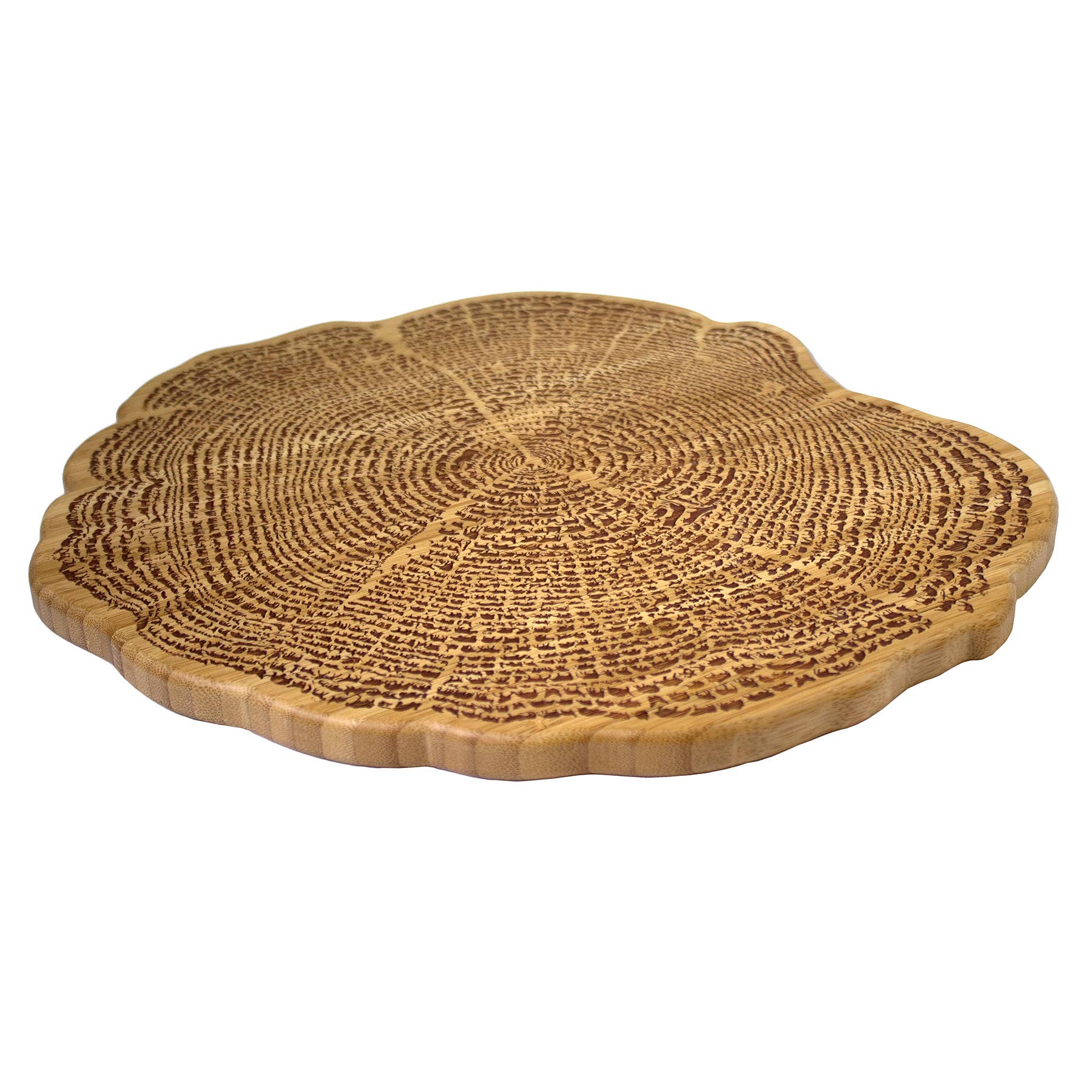 The "Tree Of Life 13" Serving Board features a round wooden design with a tree ring pattern on the surface, crafted from sustainable bamboo, evoking the essence of nature.