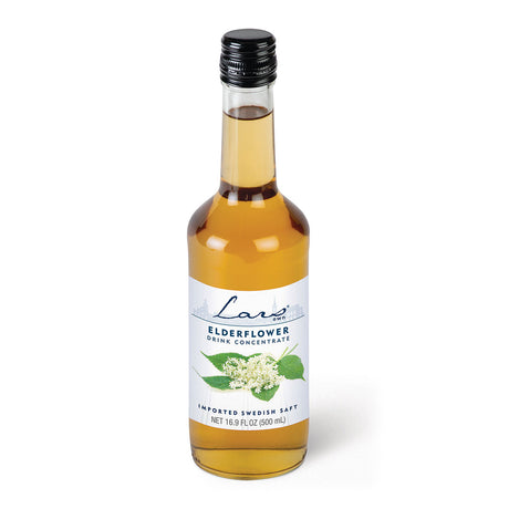 A 16.9 fl oz glass bottle of Lars Own Elderflower Drink Concentrate (Saft) features a black cap and floral label design that embodies the traditional Scandinavian charm of saft syrup.