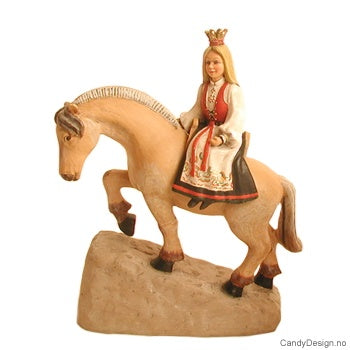 A porcelain figurine named "Girl on Horse," depicting a woman in traditional Norwegian dress crowned and posed majestically on a rock.