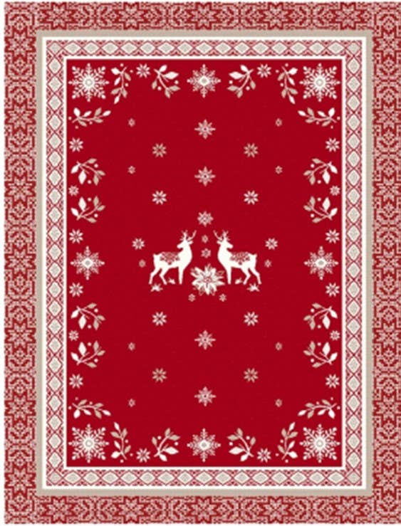 Red rectangular cotton tea towel featuring two white reindeer in the center, surrounded by snowflakes, floral motifs, and geometric borders in a Scandinavian-inspired pattern.