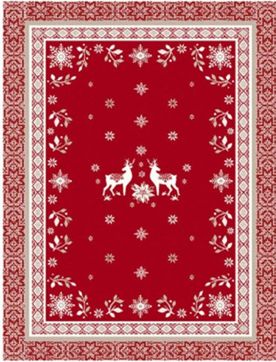 Red rectangular cotton tea towel featuring two white reindeer in the center, surrounded by snowflakes, floral motifs, and geometric borders in a Scandinavian-inspired pattern.