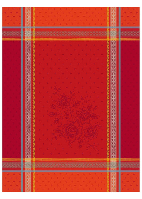 The Bouquet Red Tea Towel is a 20"x28" woven cotton tea towel with red and orange plaid, gray and yellow stripes, and a subtle central floral motif inspired by Provençal design, made using traditional jacquard weaving.