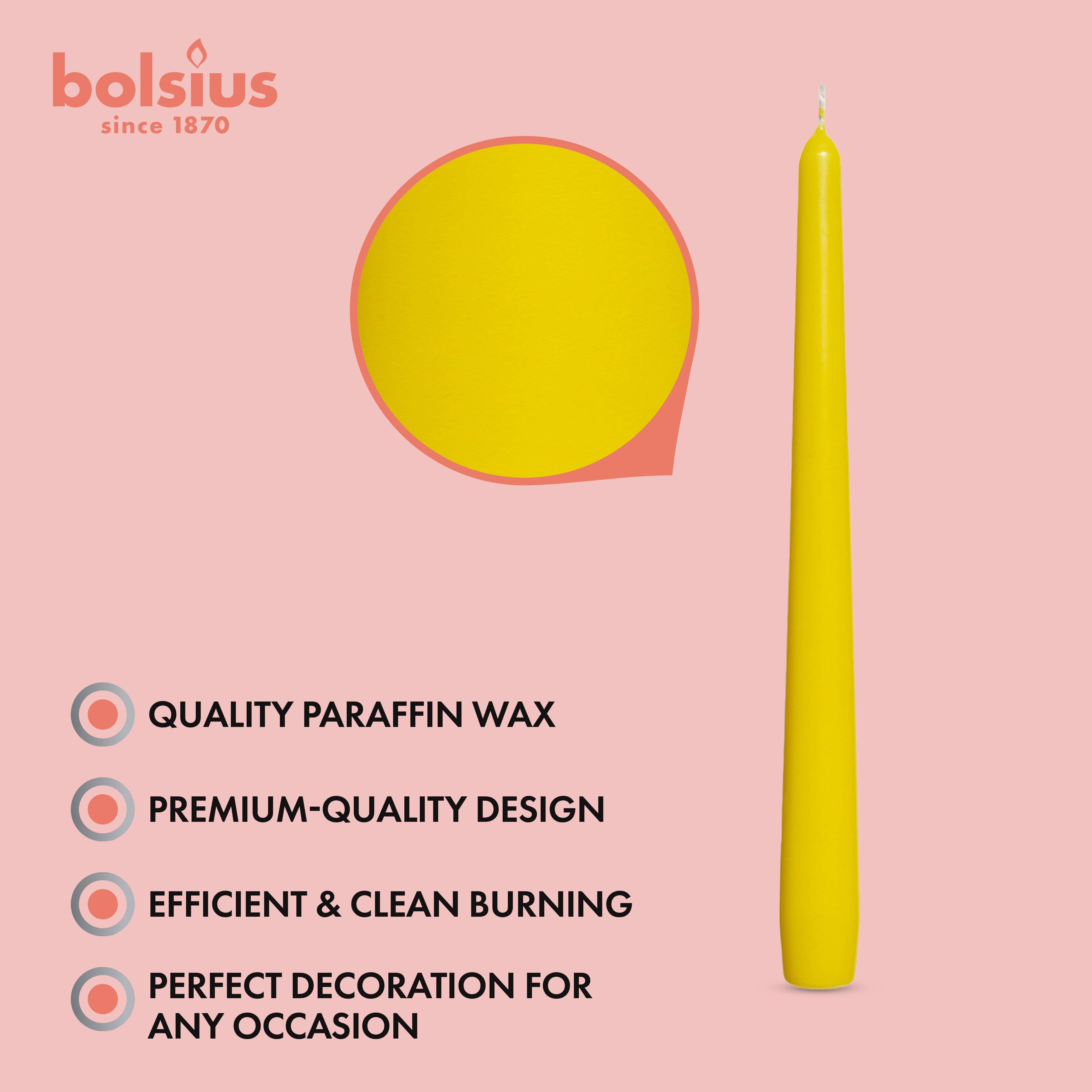 White tall 10" taper candle on a pink background with text emphasizing its unscented and dripless qualities, crafted from high-quality paraffin wax with a premium design for efficient burning, making it perfect for any occasion. Bolsius logo is featured at the top.