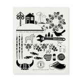 The dish cloth, titled "Made in Sweden Iconic Symbols of Sweden White with Black Print," features illustrations of quintessential Swedish symbols such as a moose, skis, a horse, and flowers. Crafted from compostable materials and proudly made in Sweden, this eco-friendly design also incorporates geographical coordinates and a Swedish phrase to emphasize its genuine cultural charm.