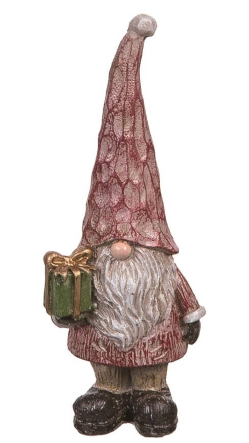 The Gnomes: Mini Gnomes Holding a Christmas Decoration features a resin figurine with a tall red hat, white beard, and pink nose, holding a green gift with gold ribbon—perfect for festive holiday décor.