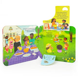 Book: Peek a Flap God 12 Chunky Flaps is an illustrated lift-a-flap book showing a diverse church group sharing snacks, singing in Sunday school, and celebrating God's love, with interactive flaps and a pull-tab question about favorite songs.