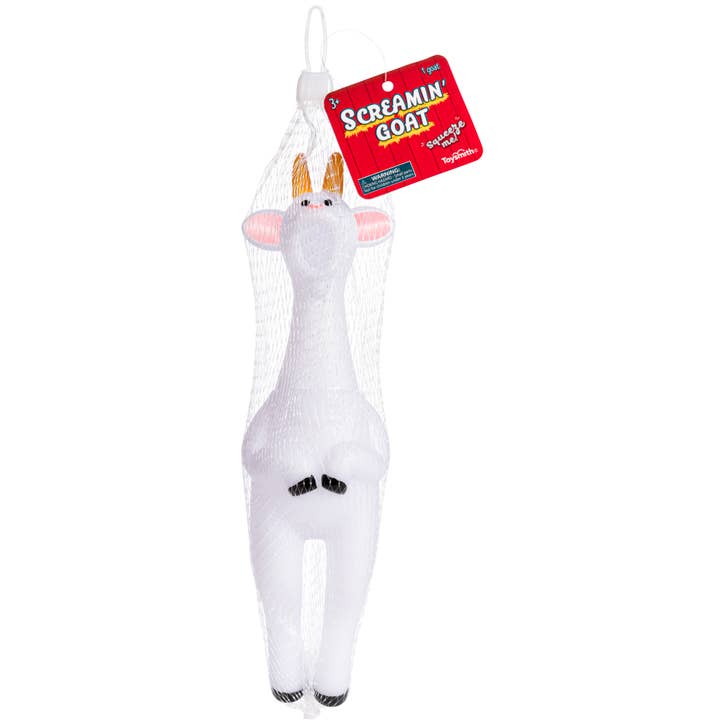 The Toy: Screamin Goat - Rubber Goat is a white rubber goat with yellow horns in a mesh bag, featuring a red tag—ideal for novelty collectors and prank lovers.